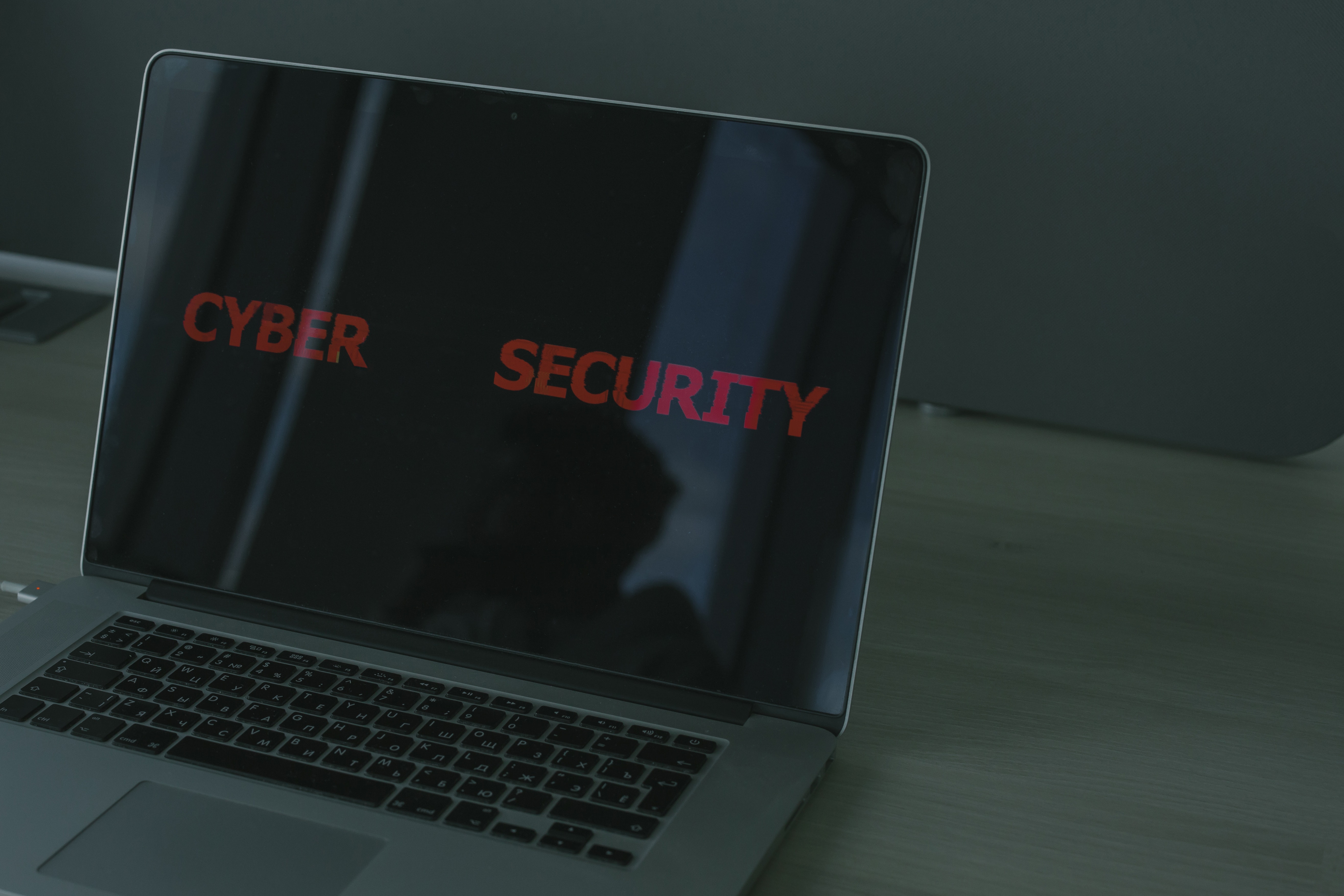 Laptop with the text cybersecurity on the screen